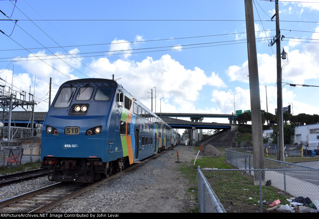 Northbound Tri-Rail train arriving into Hialeah Market Station behind a Rotem Cab Car